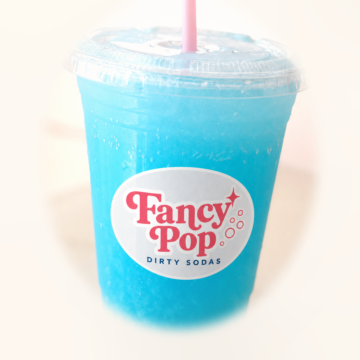 Blue Fancy Pop dirty soda with pink straw